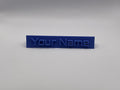 Custom 3D-printed desk nameplate personalized with a name, in blue